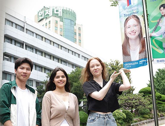 International Students Light Up the Campus with New Streetlamp Banners